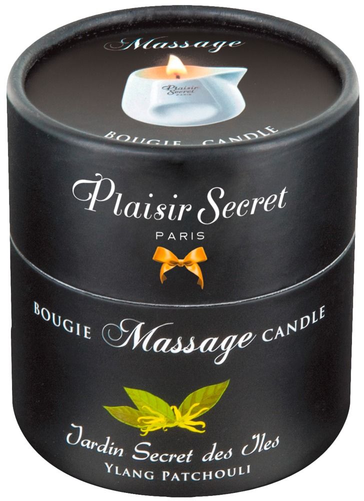 Schwarze zylindrische Verpackung mit Produktnamen und Aufschrift "Massage Candle". Oben eine Abbildung der Kerze.