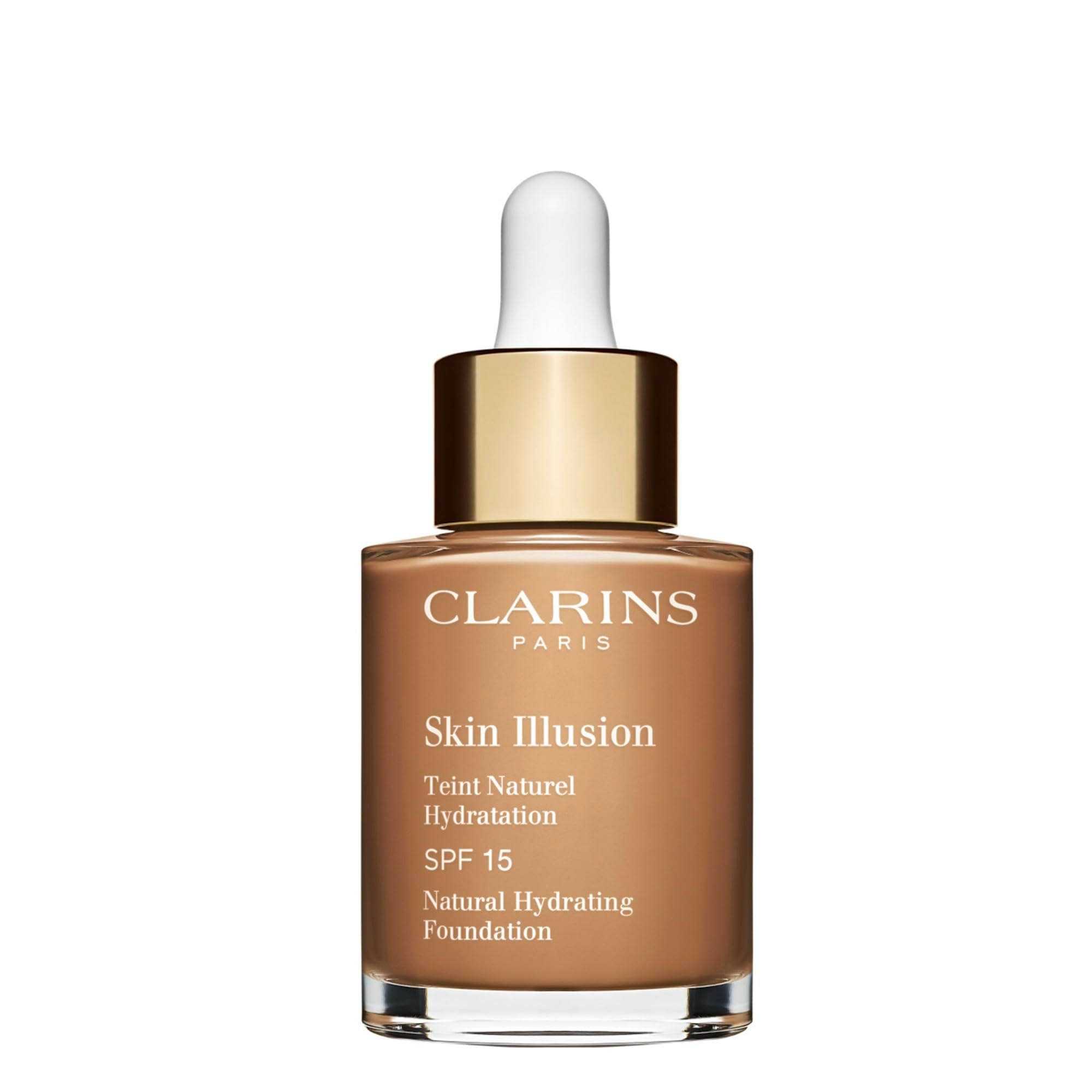 Flüssiges Make-up-Fläschchen. Marke Clarins, Skin Illusion, SPF 15. Braune Flüssigkeit in Glasflasche mit Pipette.