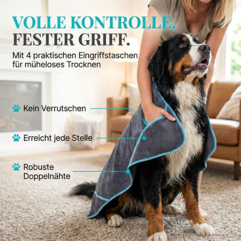 Hund wird mit einem grauen Handtuch abgetrocknet. Text: Volle Kontrolle. Fester Griff. Mit 4 Eingriffstaschen.