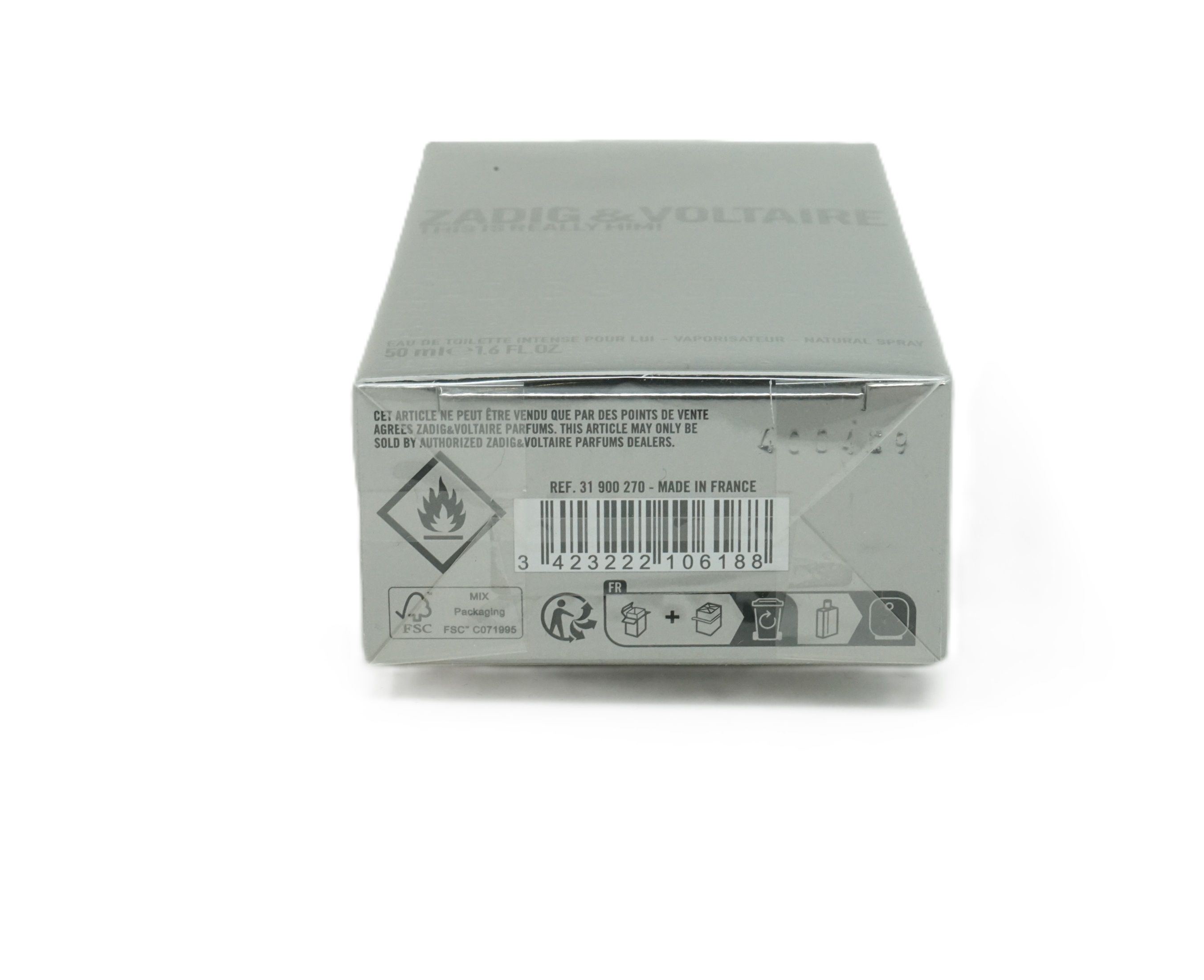 Graue Verpackung mit Barcode und Piktogrammen. Aufschrift: Zadig & Voltaire. Ref. 31 900 776 - Made in France.
