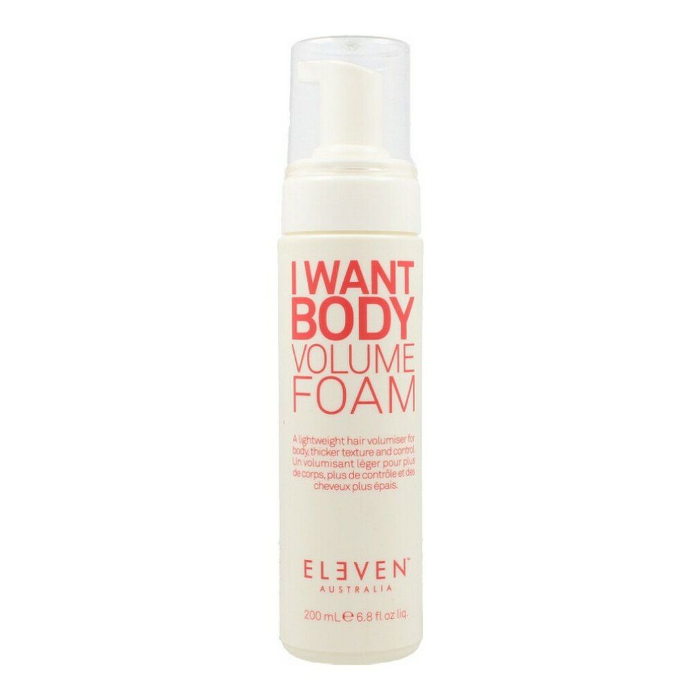 Beige Flasche mit roter Schrift: I WANT BODY VOLUME FOAM. Marke: ELEVEN AUSTRALIA. Mit Pumpverschluss. Text in Englisch und Französisch.