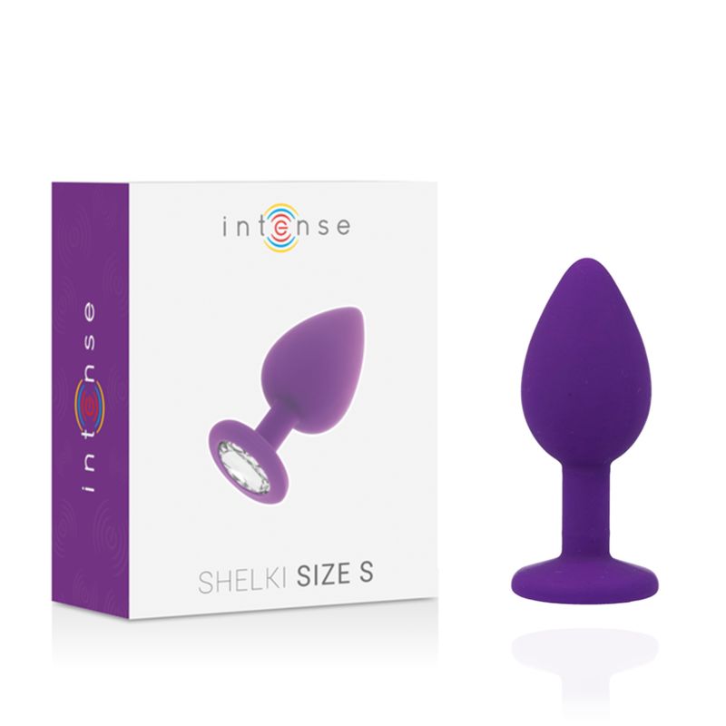 Lila Analplug mit Kristall und Verpackung. Auf der Verpackung steht "Intense" und "Shelki Size S".