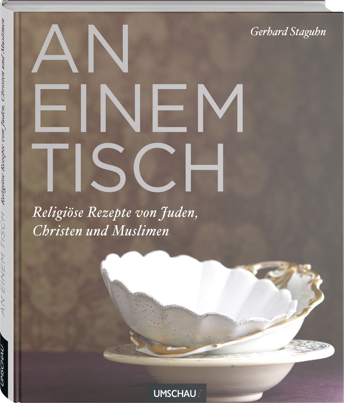 Buchcover: "An einem Tisch". Titel und Untertitel in Großbuchstaben. Darunter zwei weiße Schalen. Autor: Gerhard Stagubn. Verlag: Umschau.