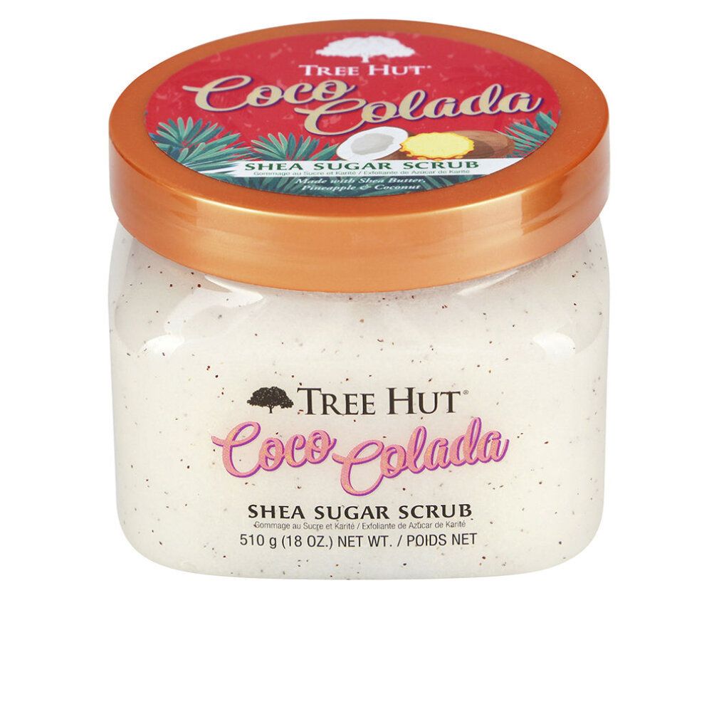 Tree Hut Coco Colada Shea Sugar Scrub in einem durchsichtigen Behälter mit orangefarbenem Deckel und Etikett.